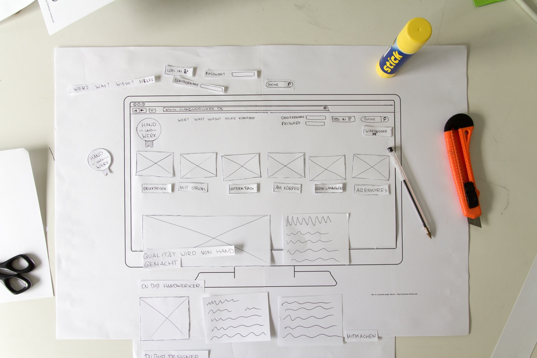Original 2013 paper prototype of the Hand und Werk shop, with cut-out navigation and product tiles